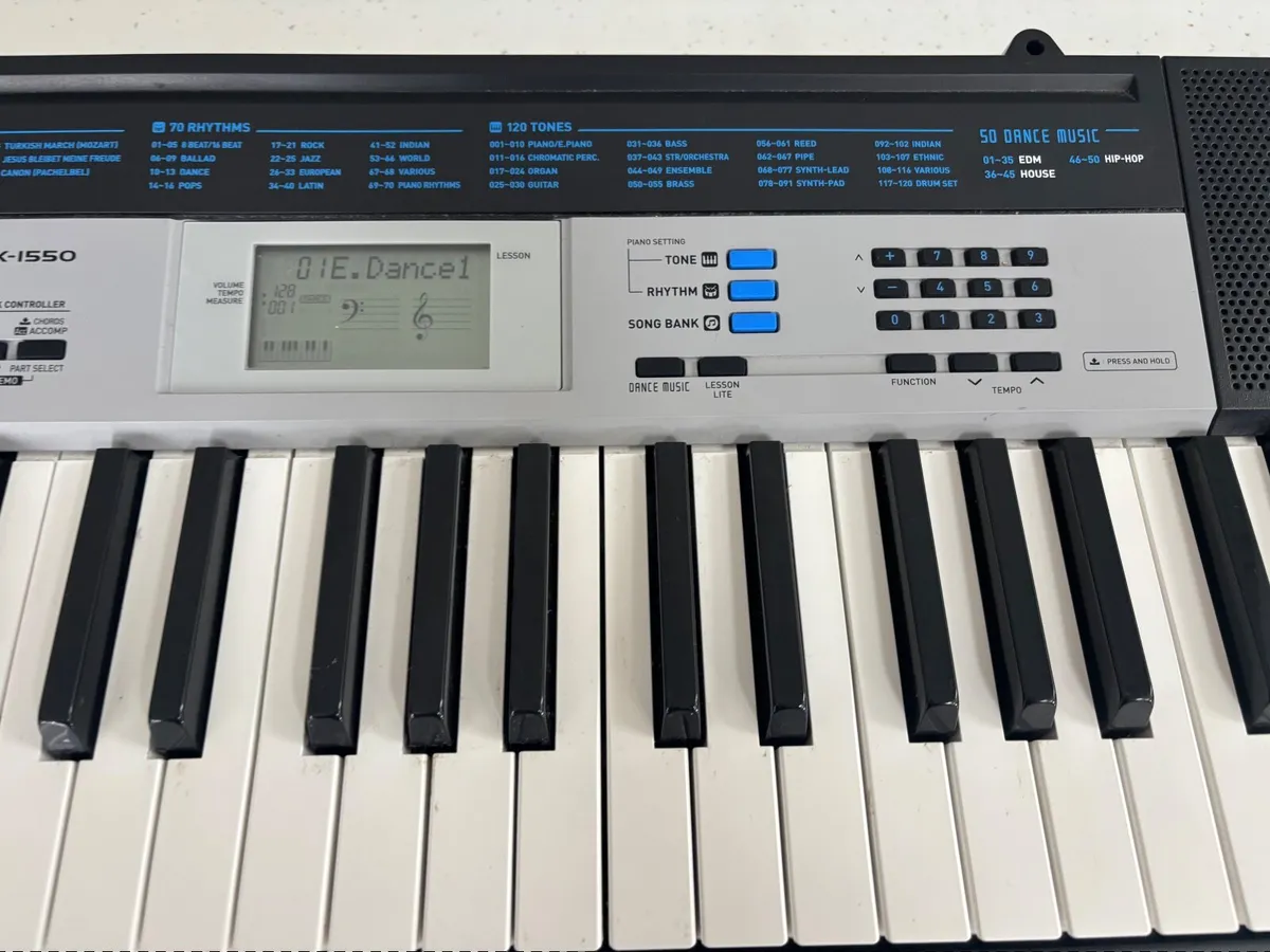 Casio electric keyboard with stand - Image 1