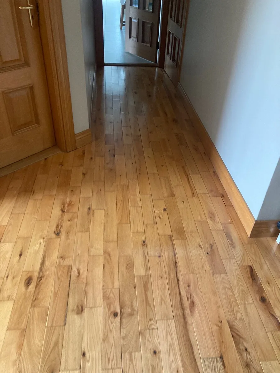 Solid wood floor - Image 1
