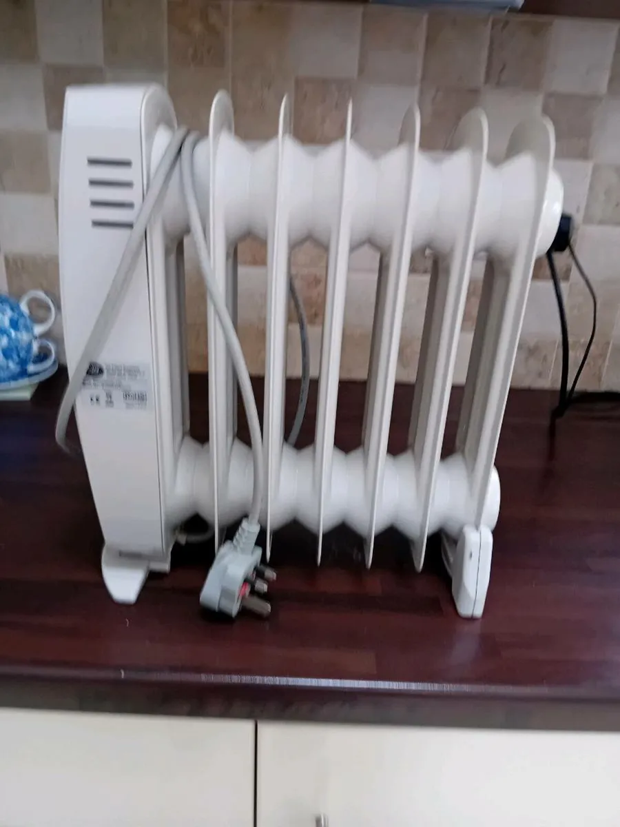 MINNI OIL FILLED ELECTRIC HEATER NEW