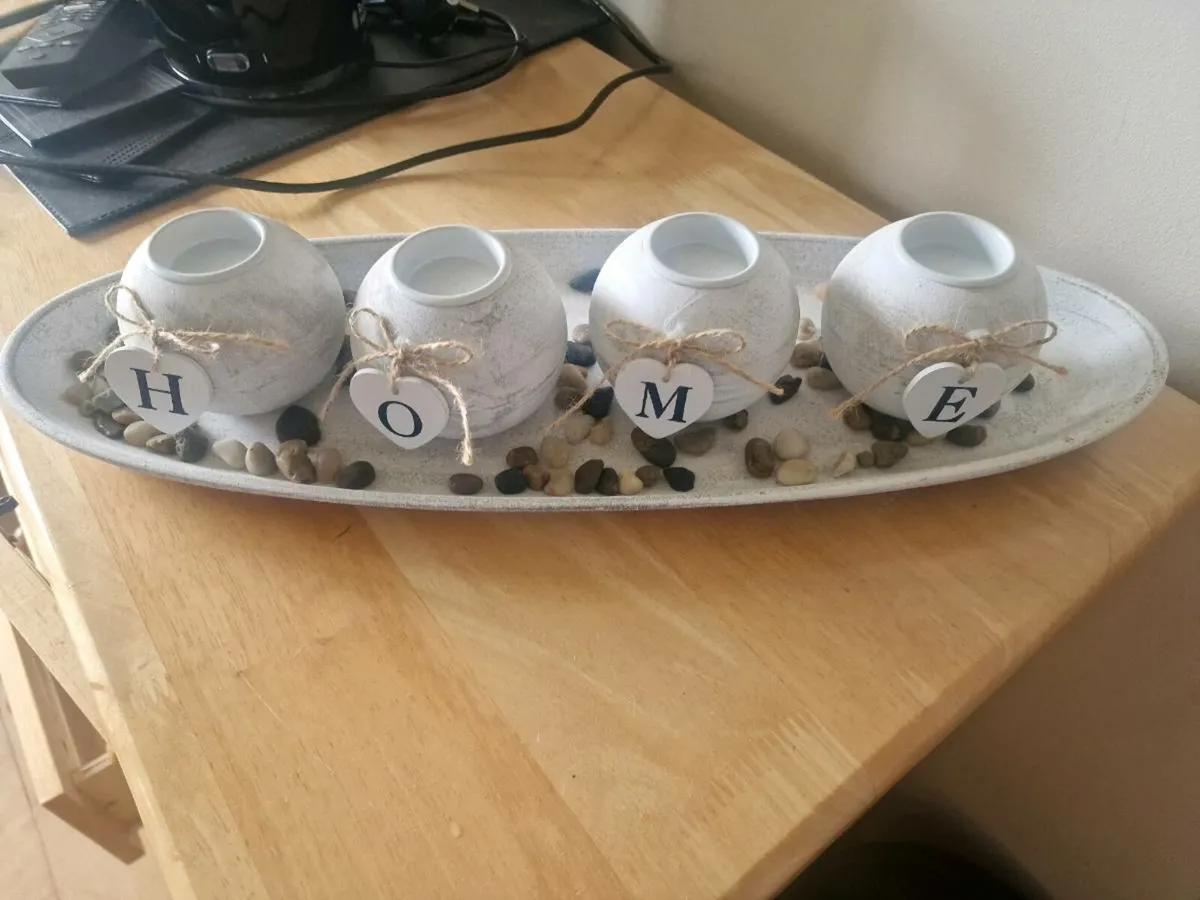 Home candle holders on plate