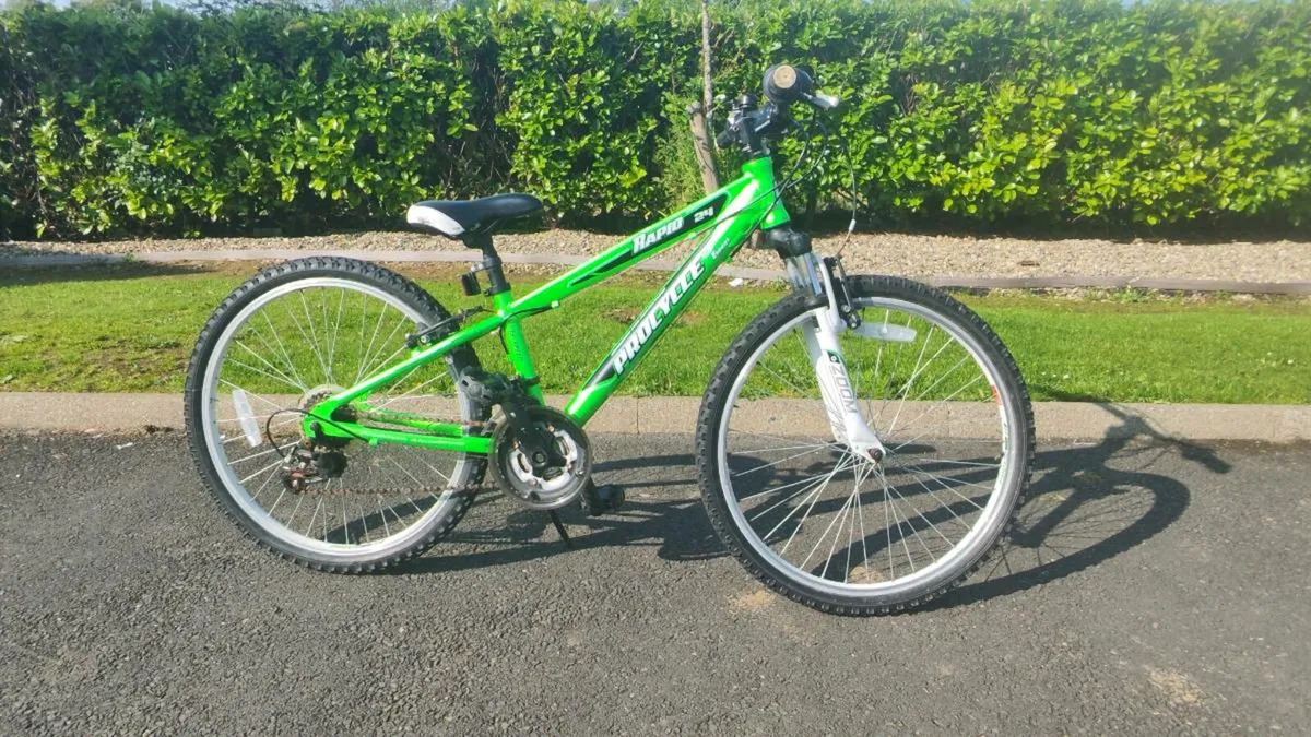 Kids Bikes + Green Huffy Machine - Image 1