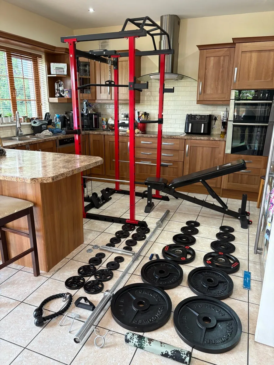 UNBELIEVABLE GYM SQUAT RACK WEIGHTS SET UP - Image 1