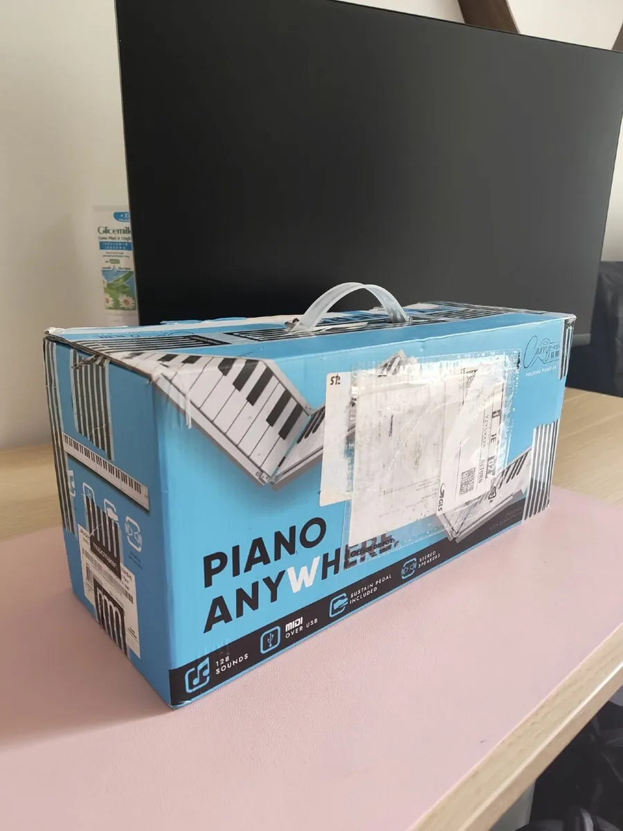 Folding Piano - Image 1