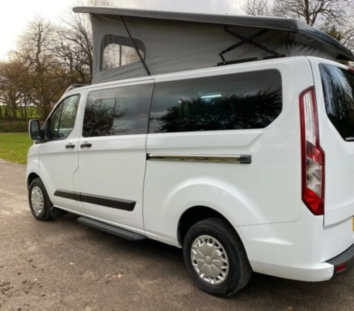 Camper crew cab conversion glass panels - Image 1
