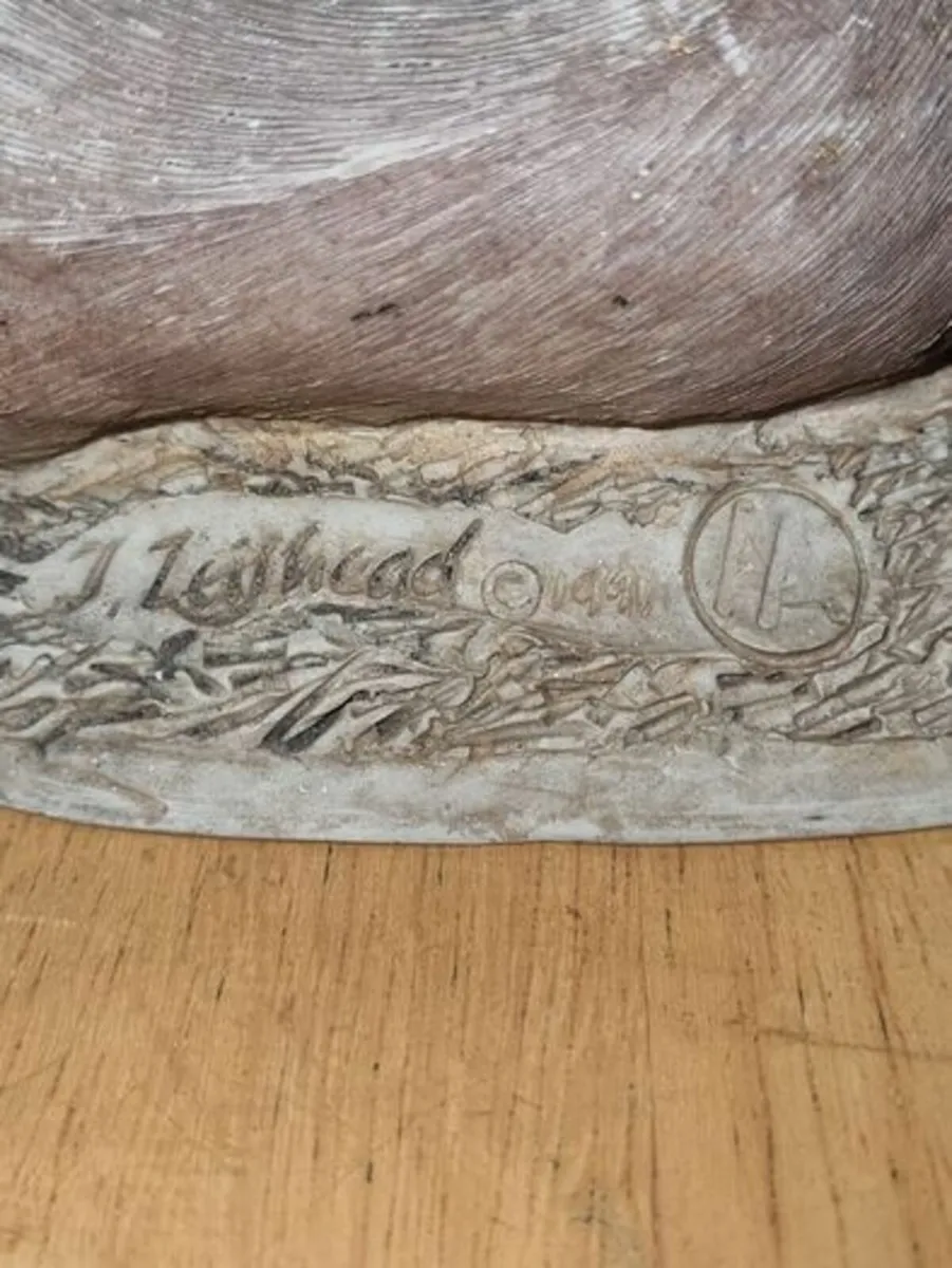 Sculpture of a boy sleeping with a dog - Image 4