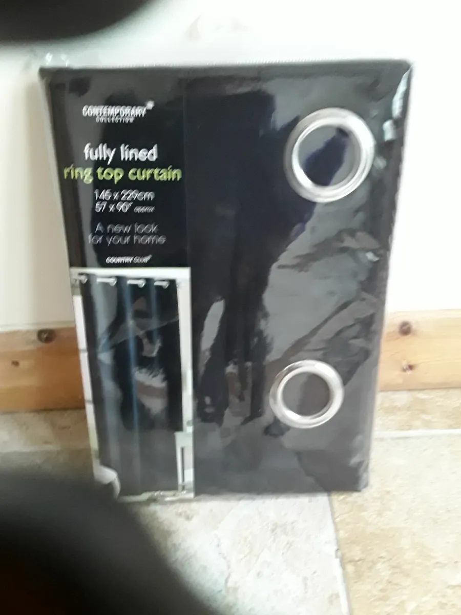 Brand new unopened black eyelet drapes - Image 1