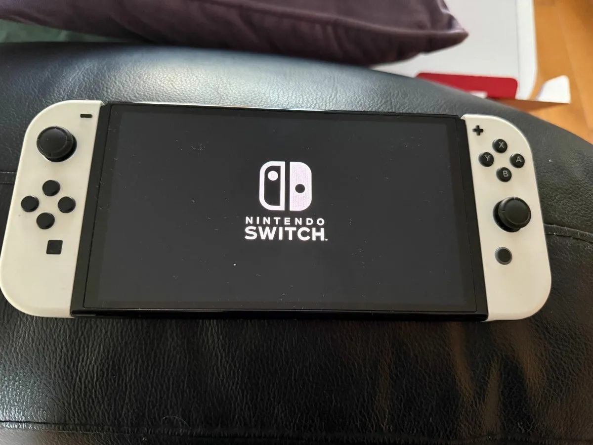 Nintendo Switch OLED + Accessories - Image 1