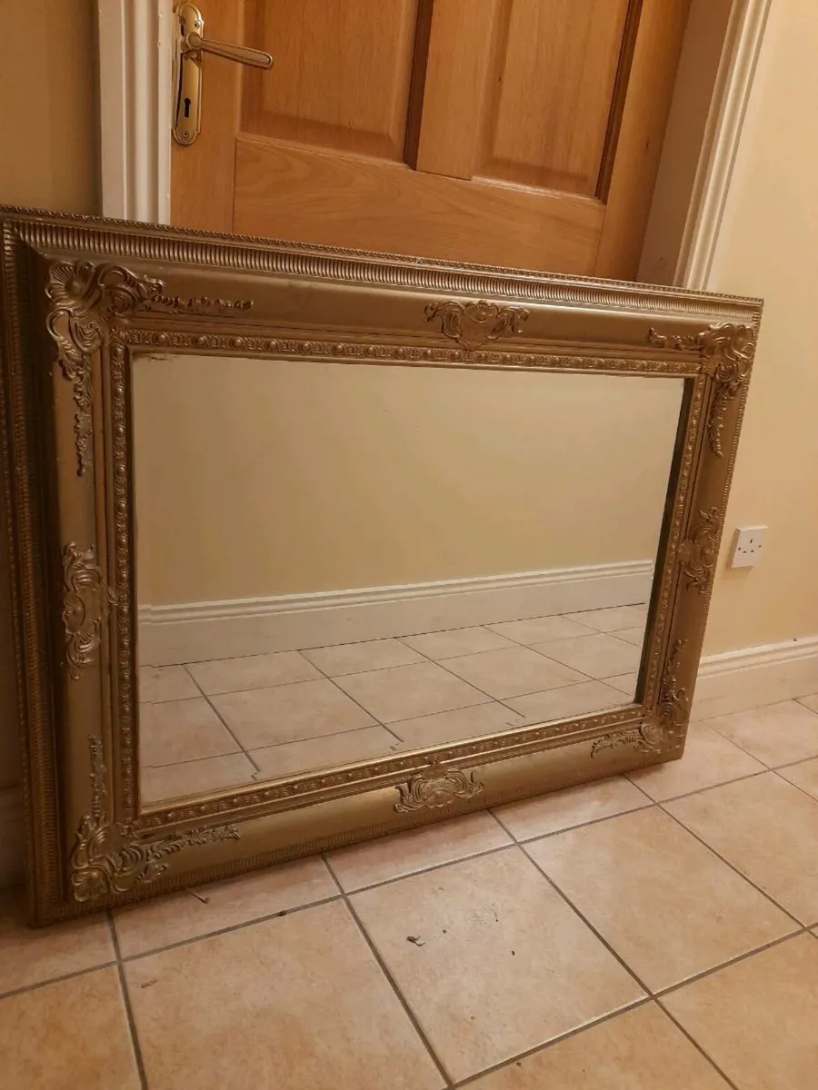 Gold.framed.mirror.
