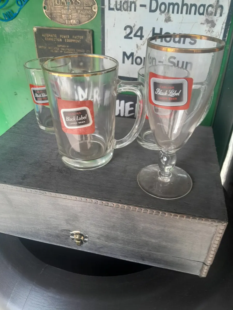 Four  vintage  carling  glasses - Image 1
