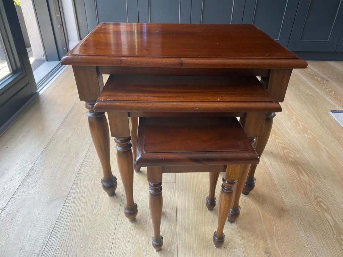 Nest of mahogany tables
