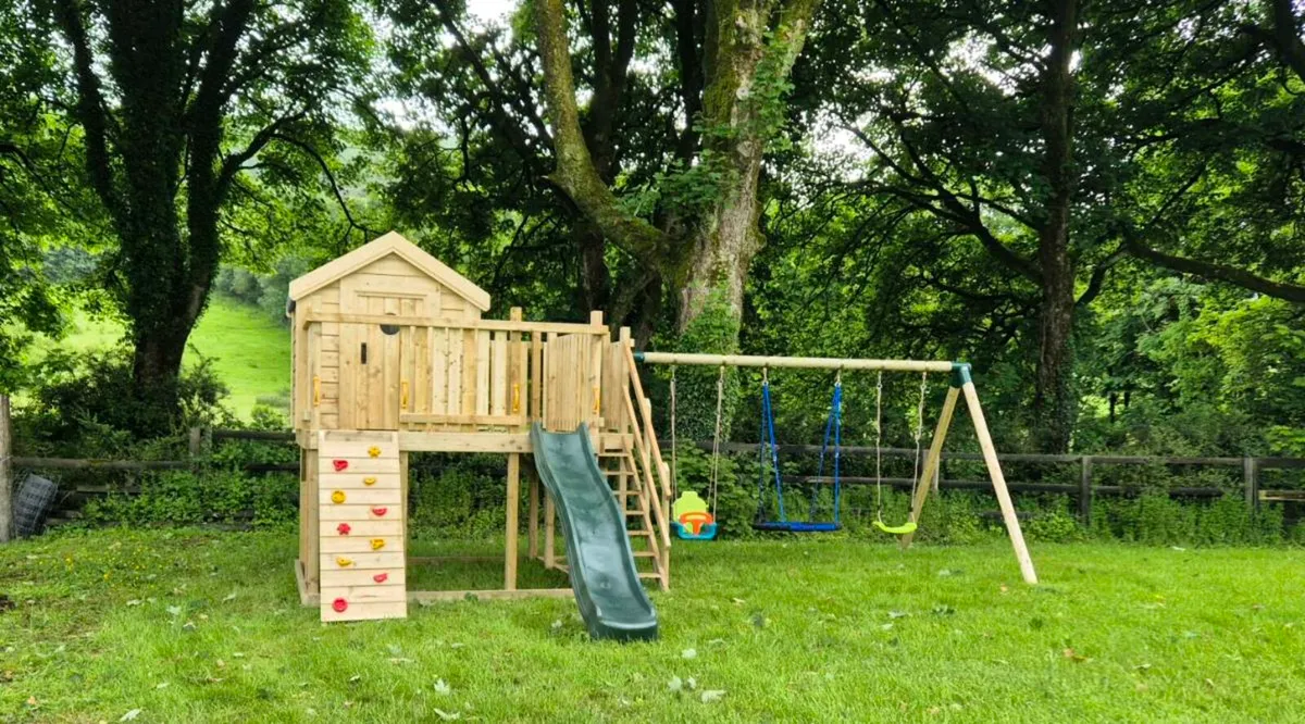 Wooden Playhouse and Activity centres - Image 1