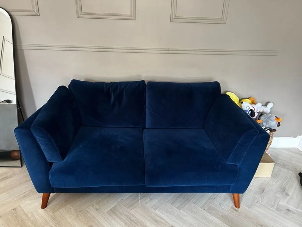Nearly new 2 seater velvet EZ living couch in navy - Image 1