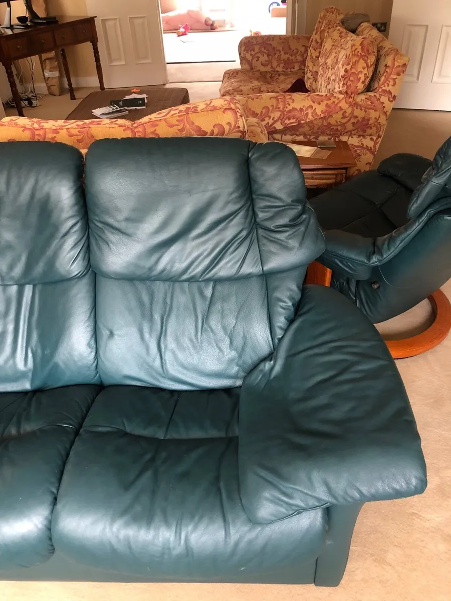 Ekorness stressless leather sofa and chair set - Image 1