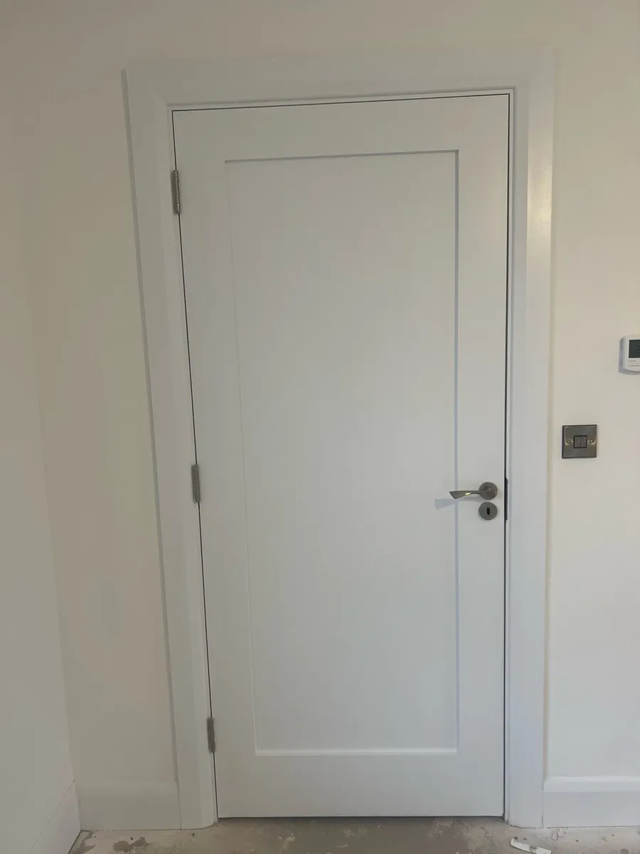 2 Deanta White Primed Door - Solid - Image 1
