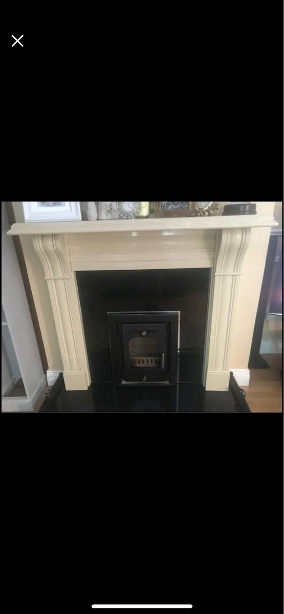 Polished stone fireplace - Image 1