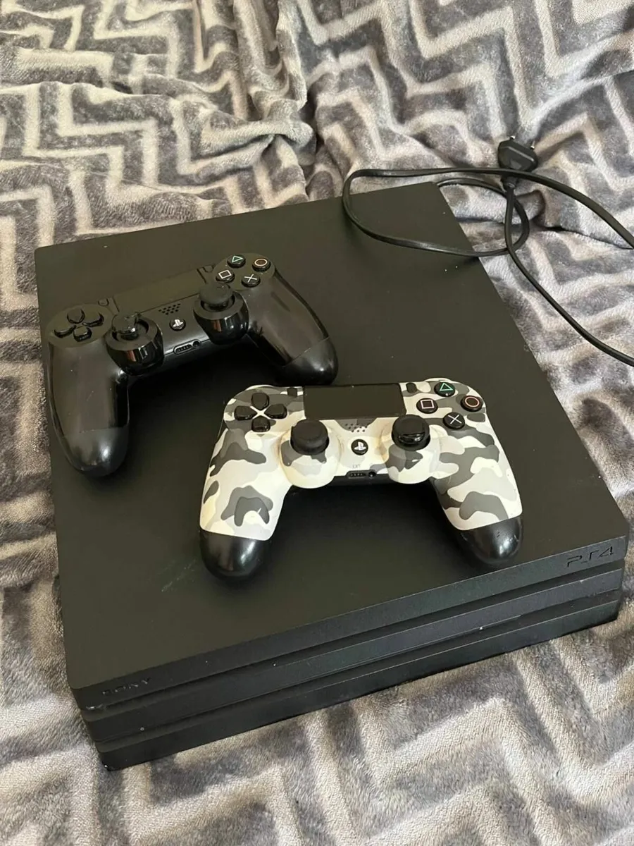 PlayStation 4 Pro (1TB) + 2 Controllers 🎮 - Image 1
