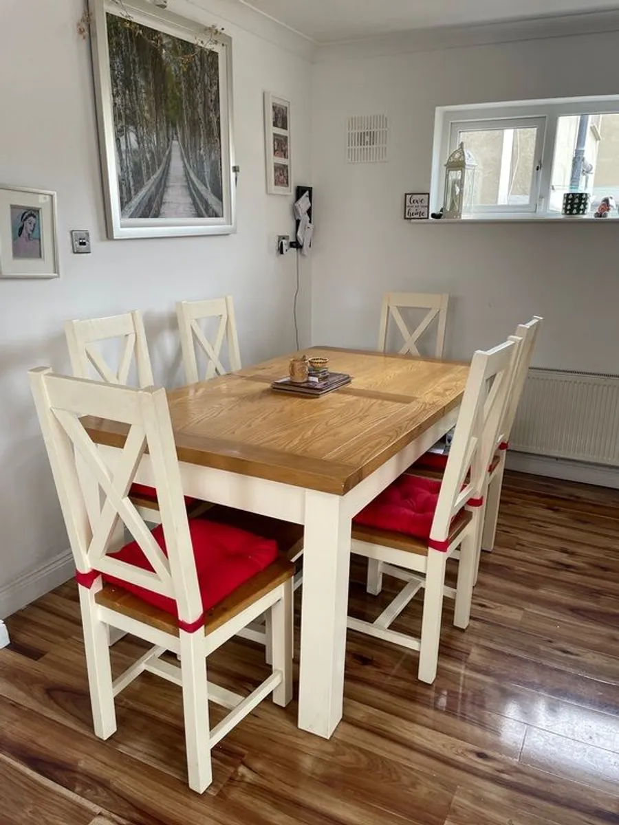 Cream oak. Dining table. Extension to 232 cm  six Chairs and a bench   Very good Condition - Image 1