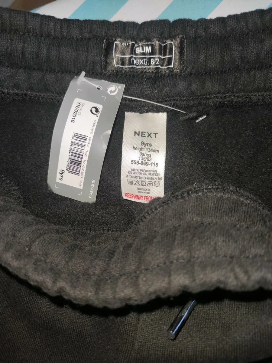 Next kids track bottoms - Image 1
