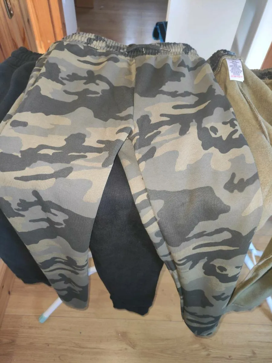 Next kids track bottoms - Image 1