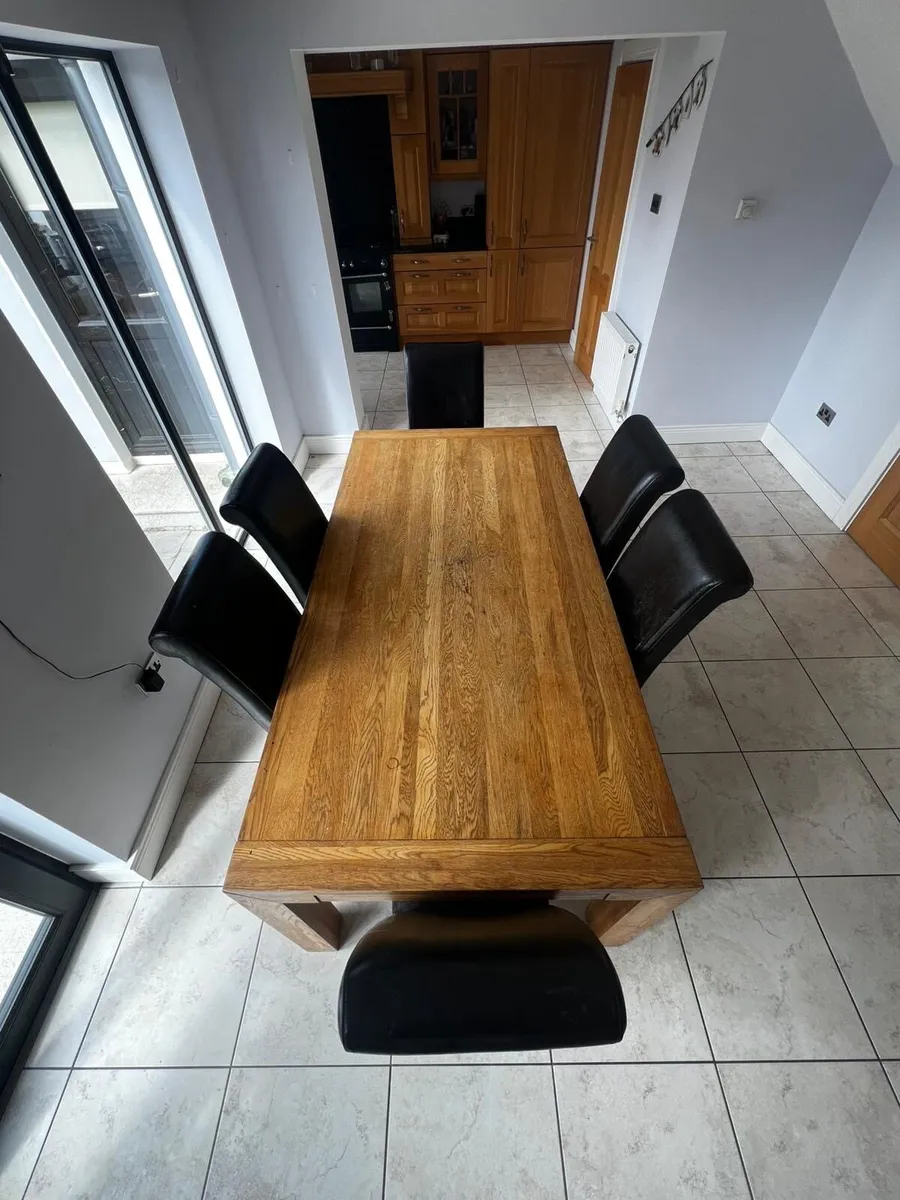 Solid oak table and chairs