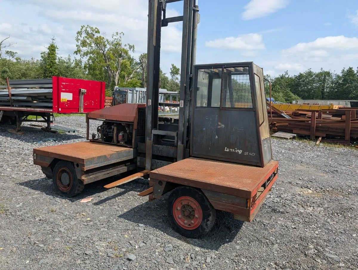 2003 S40 side loader - Image 1