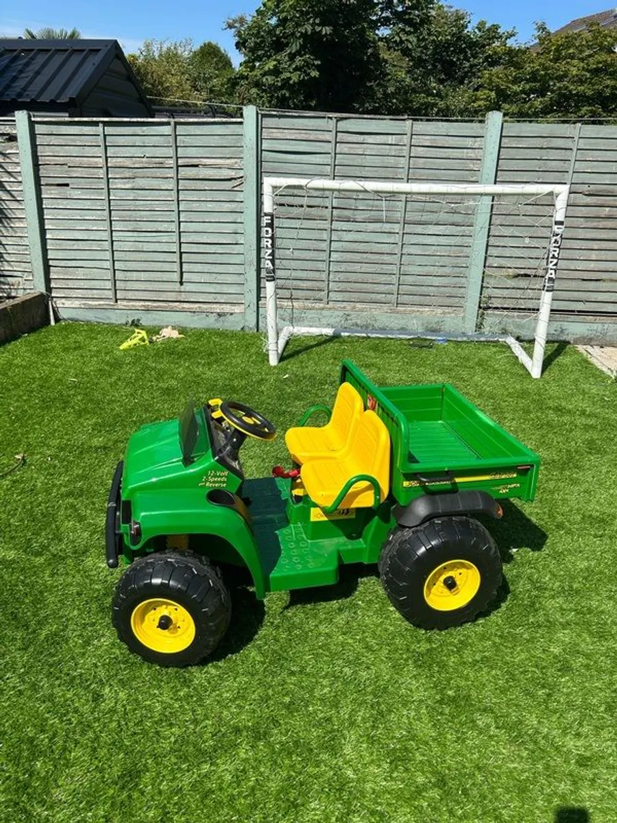 John Deer gator ride on tractor - Image 1