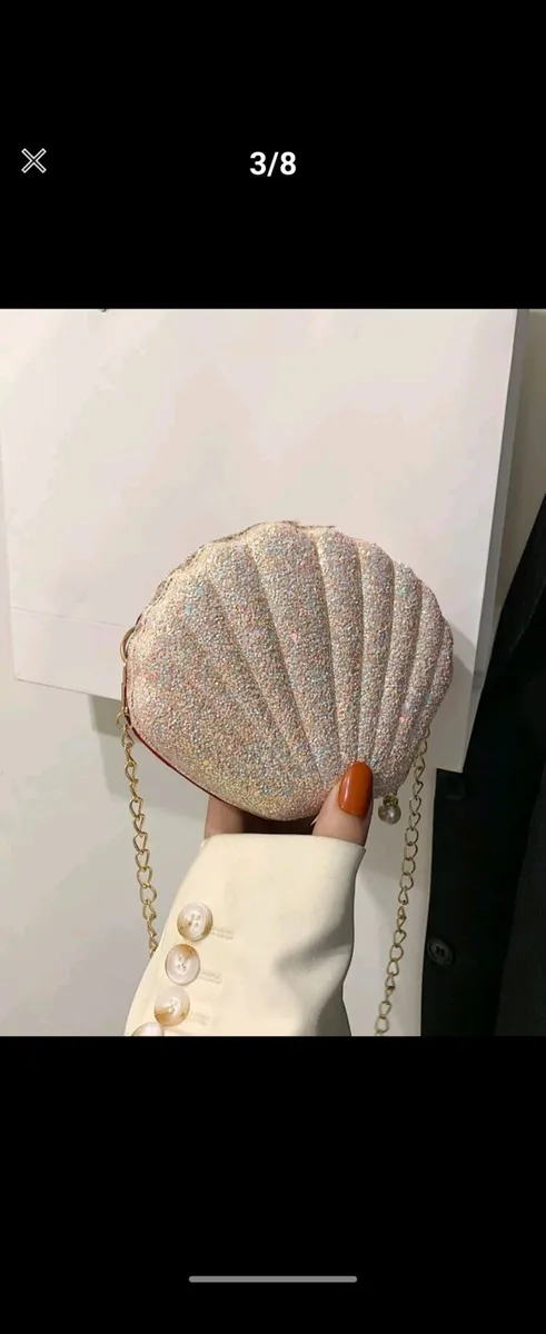 Pink glitter clutch bag shell style - Image 1