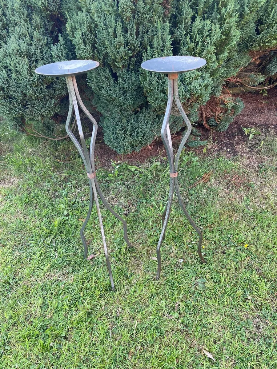 2 x heavy cast iron candle holders - Image 1