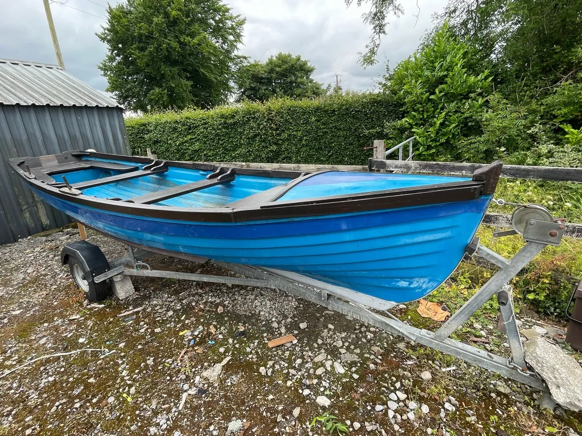 19ft Sheelin boat trailor and motor - Image 1