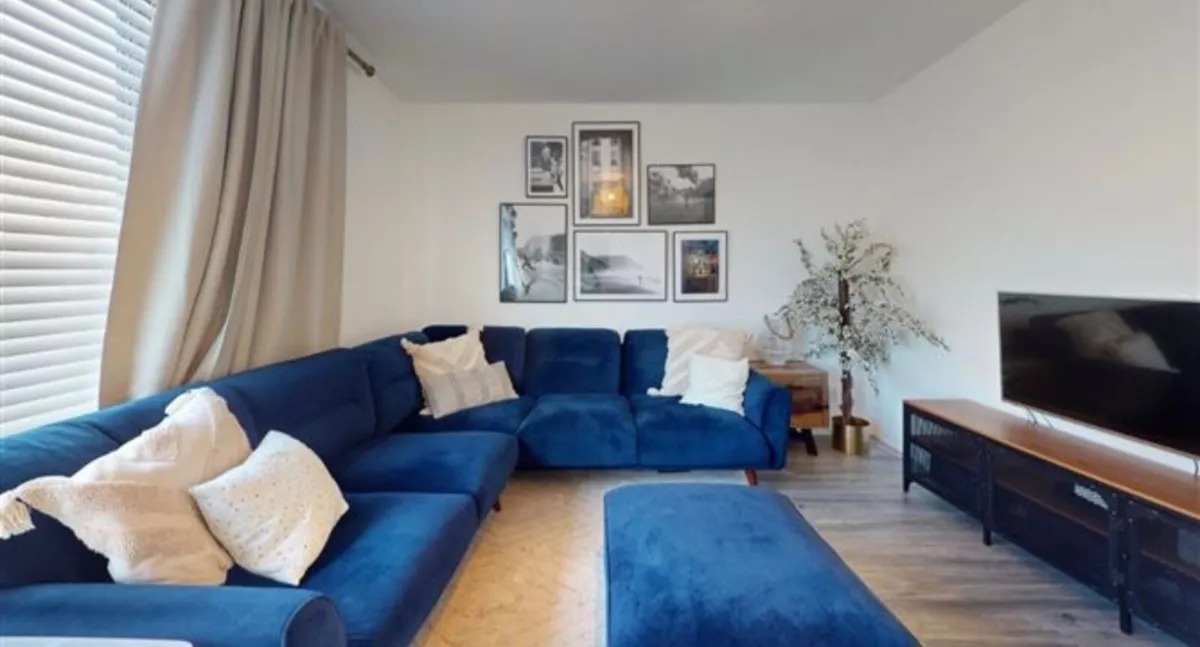 L Shaped Navy Velvet Couch - Image 1