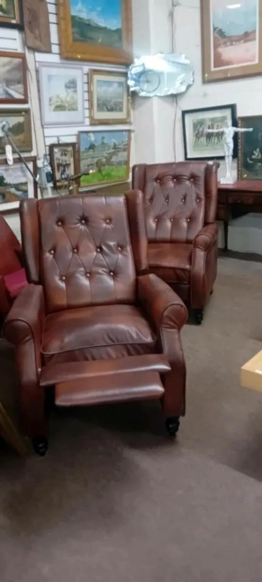 Pair Of Brown Faux Leather Recliner Chairs - Image 1