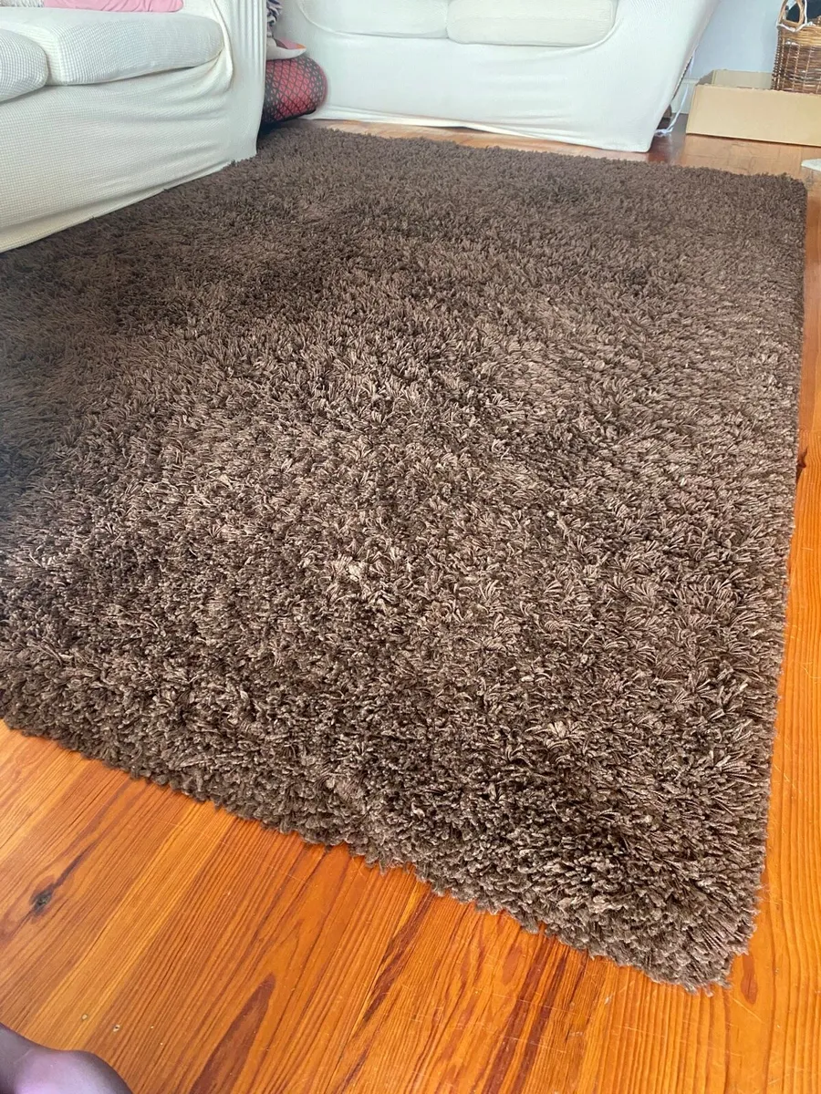 Dark brown shag rug - Image 1
