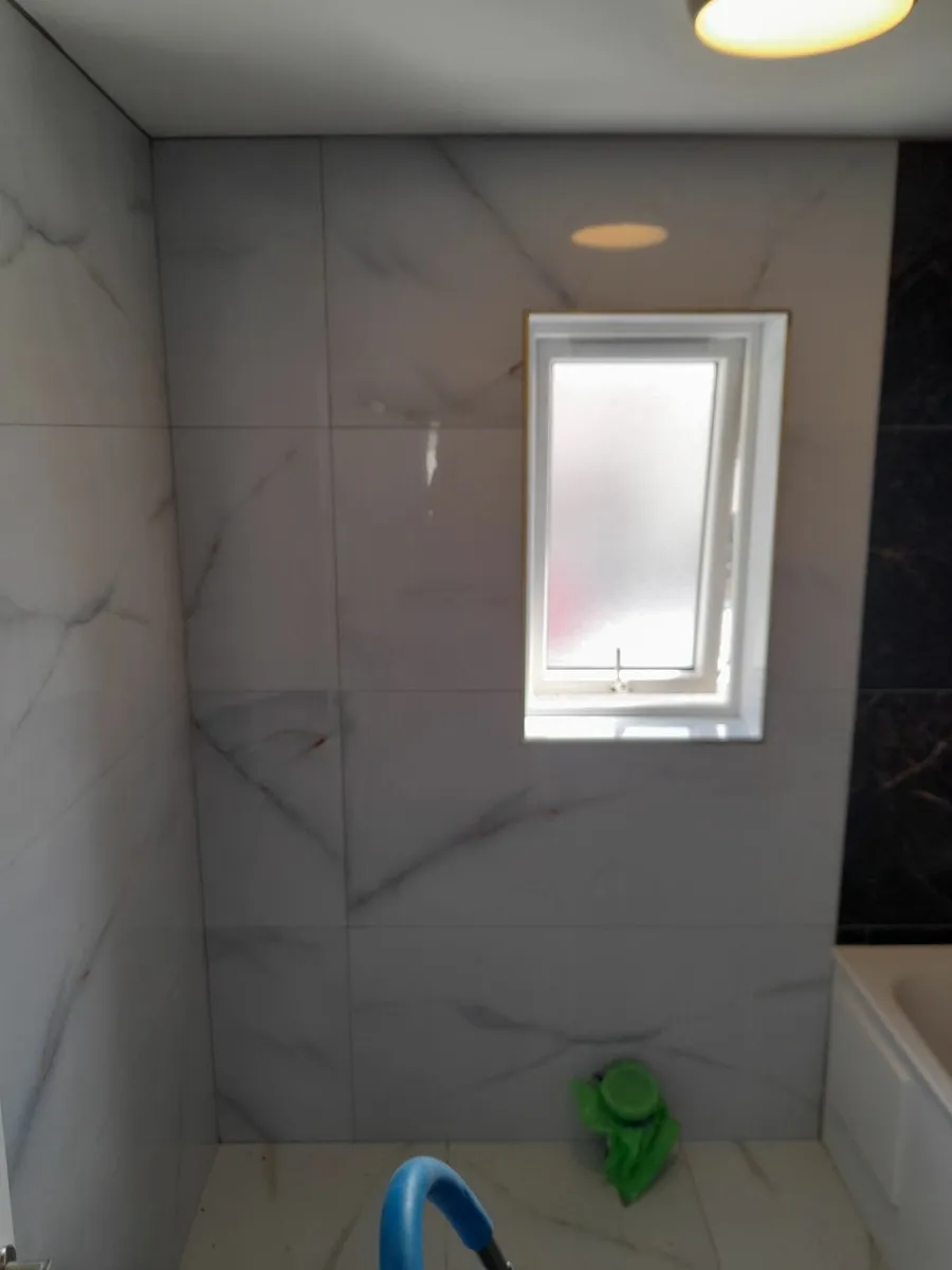 Tiling and laminate floors - Image 2
