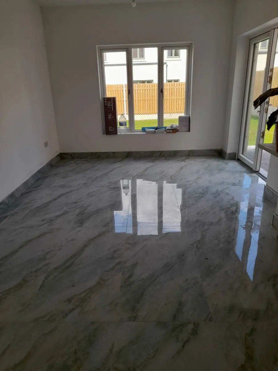 Tiling and laminate floors - Image 1