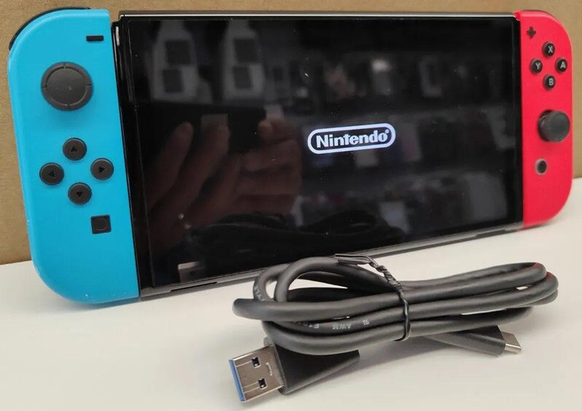 Nintendo Switch OLED 64GB Console + Joy-Cons + 128GB SD Card - Image 2