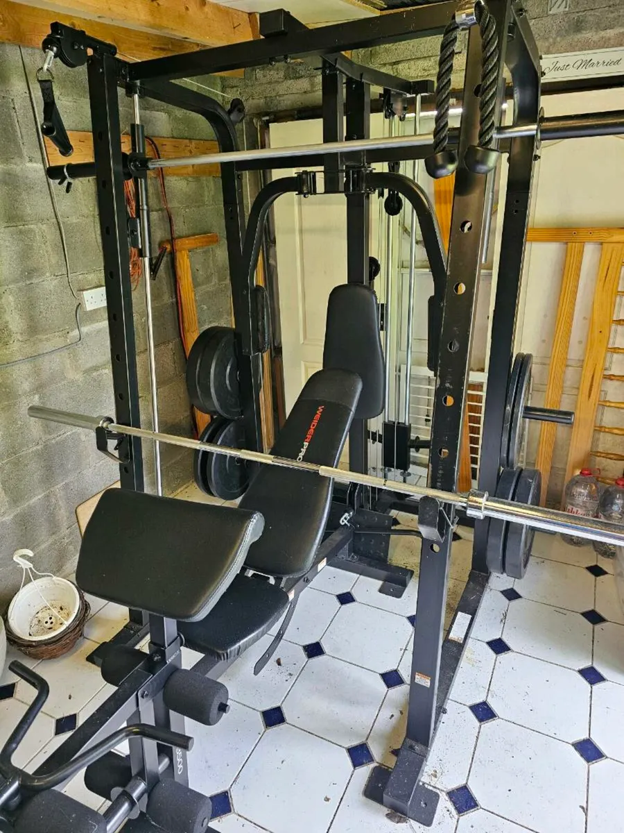 Weider Pro 8500 Smith Cage
, olympic bar + weights