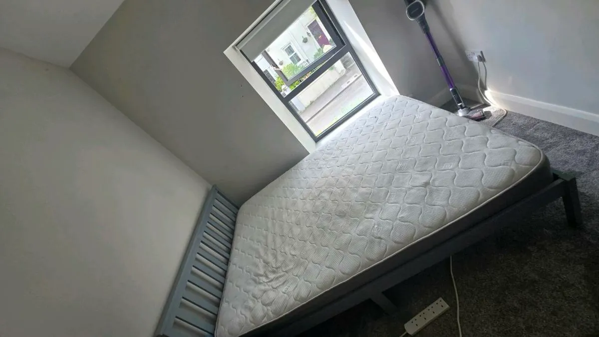 Double grey bed and mattress