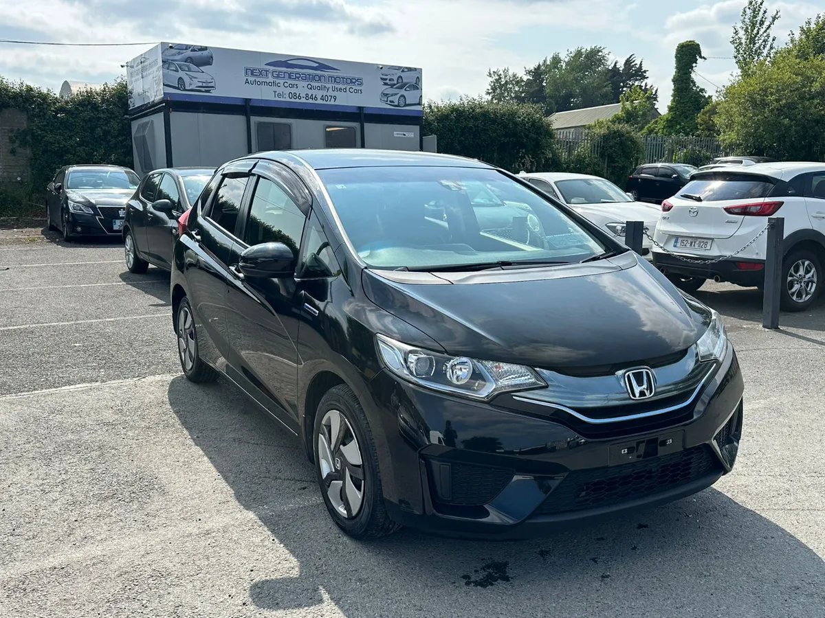 2014 HONDA FIT 1.5L HYBRID LOW MILEAGE - Image 1