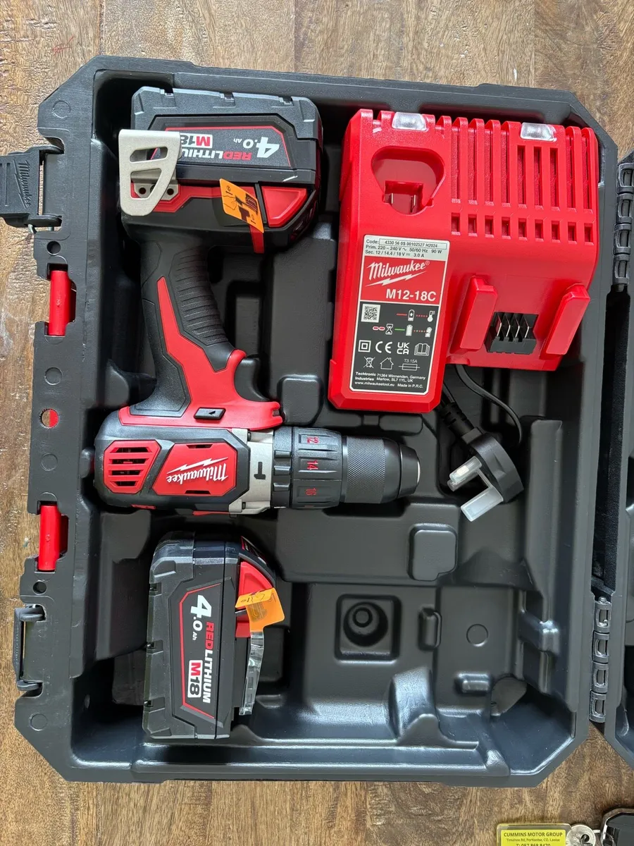 Milwaukee Drill, 2 x batteries and charger - Image 1