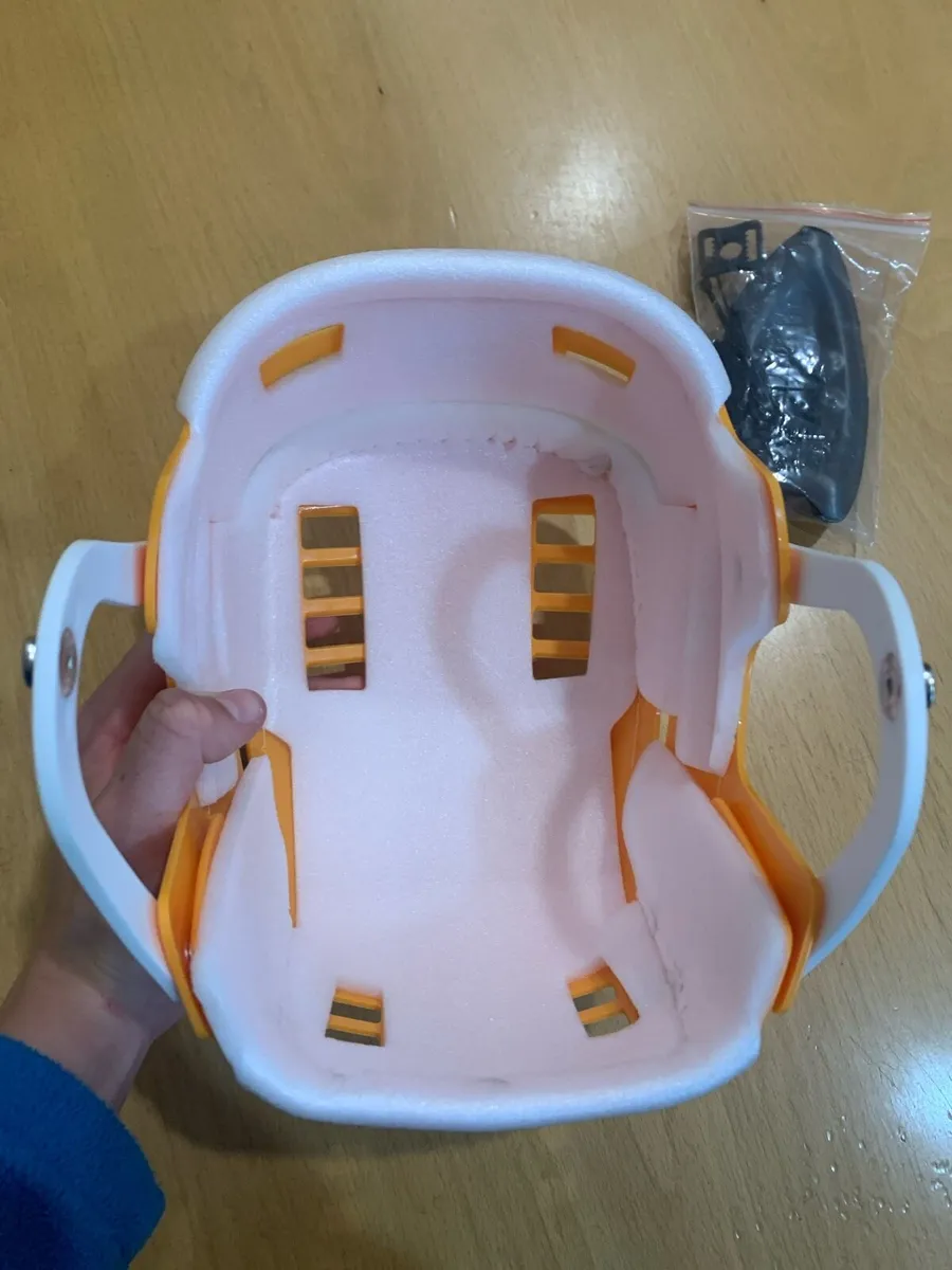 Skateboarder hurling helmet - Image 3