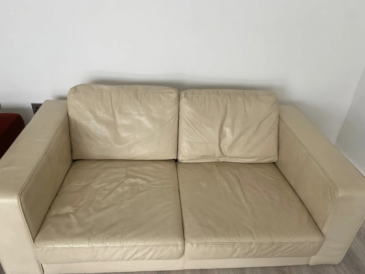 Free white two seater leather couch