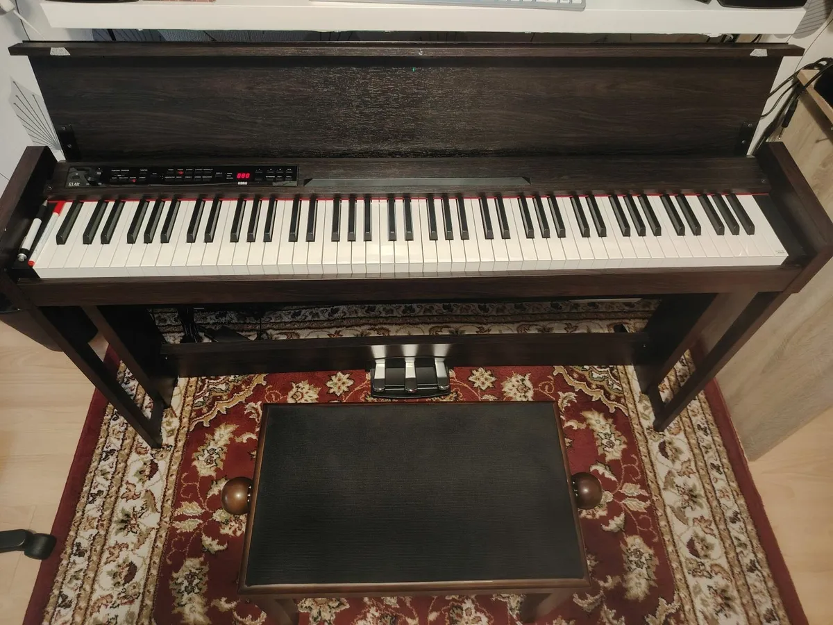 Beautiful KORG C1 AIR upright piano with bench - Image 1