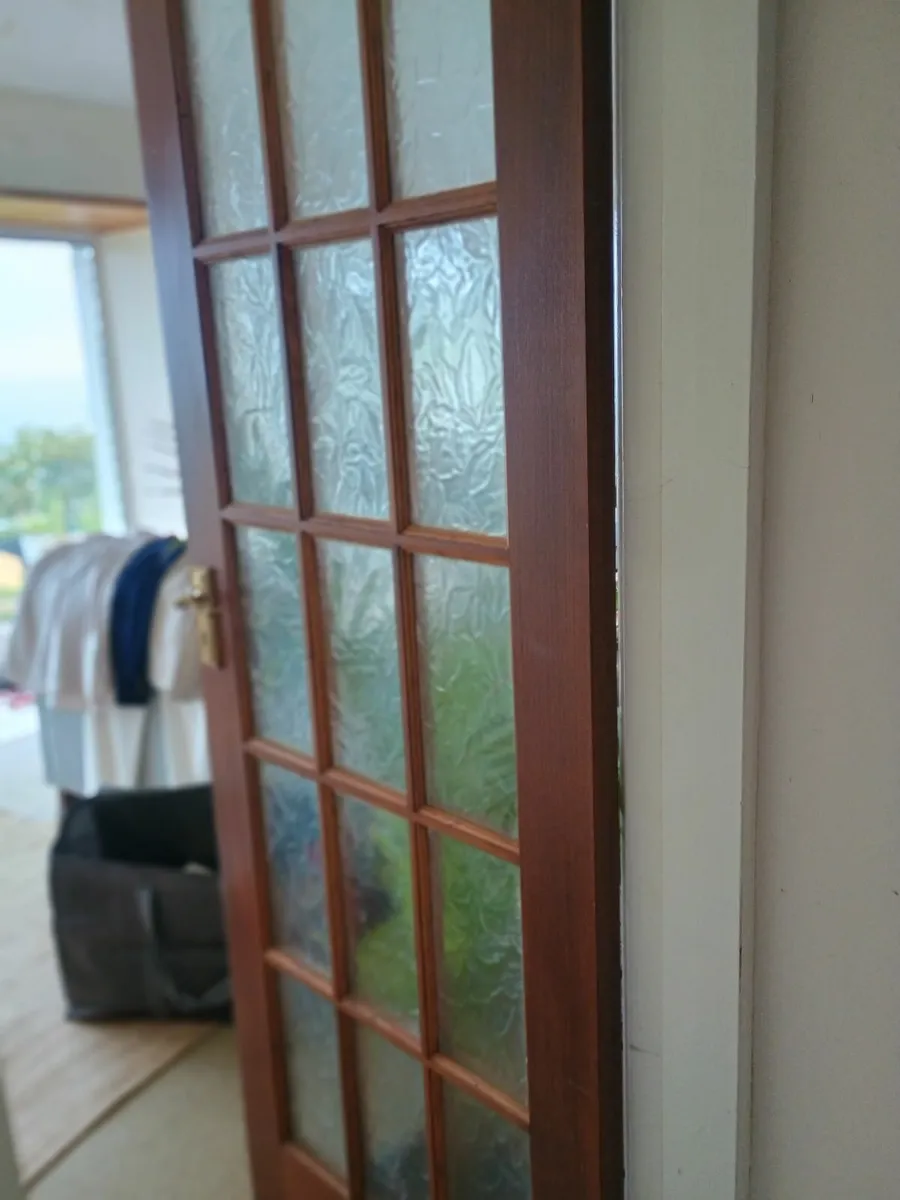 6solid teak doors and 1glass panel door - Image 1