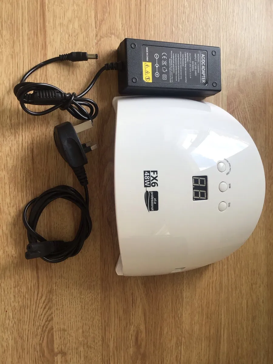 Nails dryer with 28 bottles of partly used Gel - Image 4