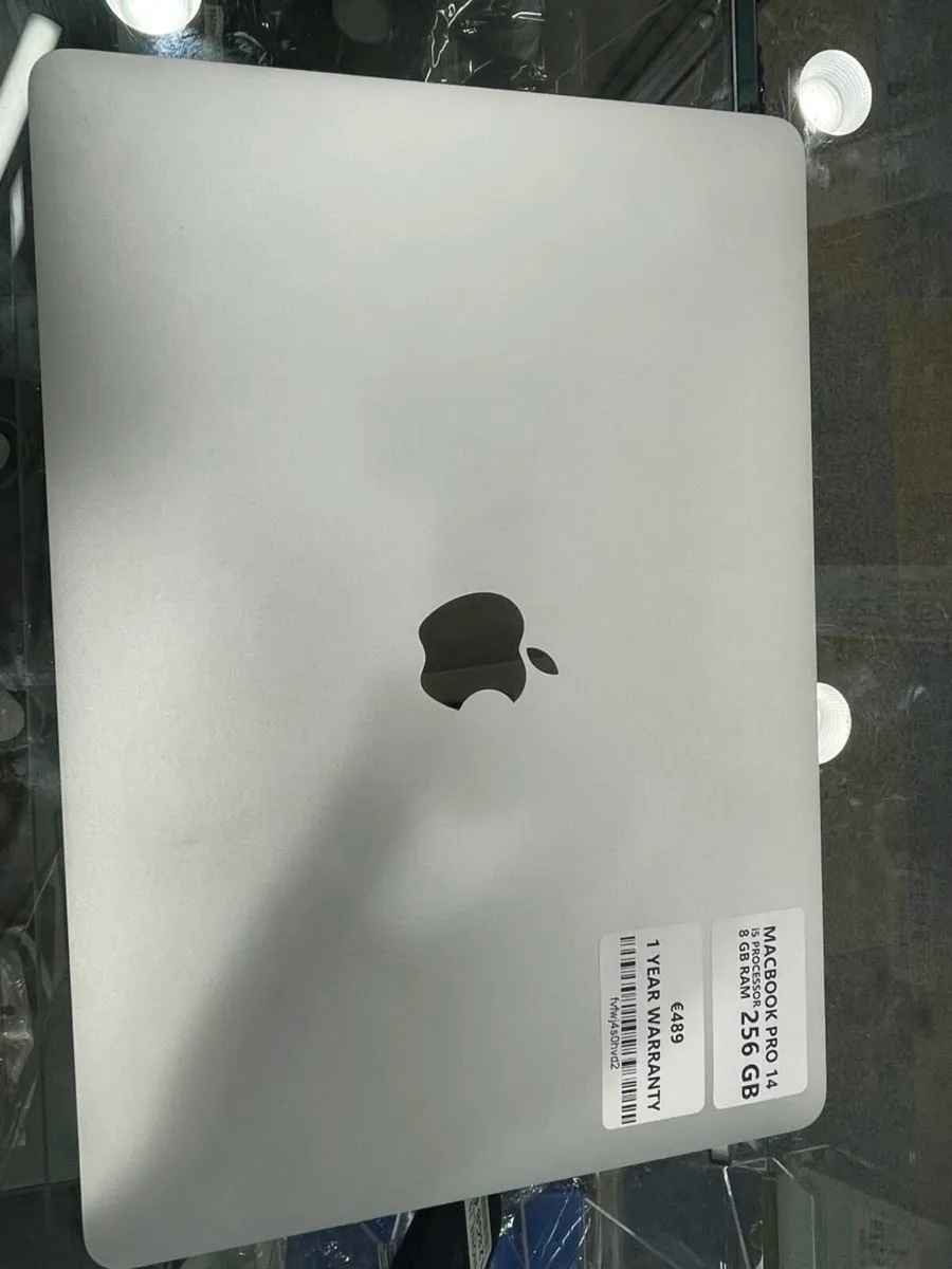 MAC BOOK PRO 14 256GB 1 YEAR WARRANTY UNLOCKED - Image 1
