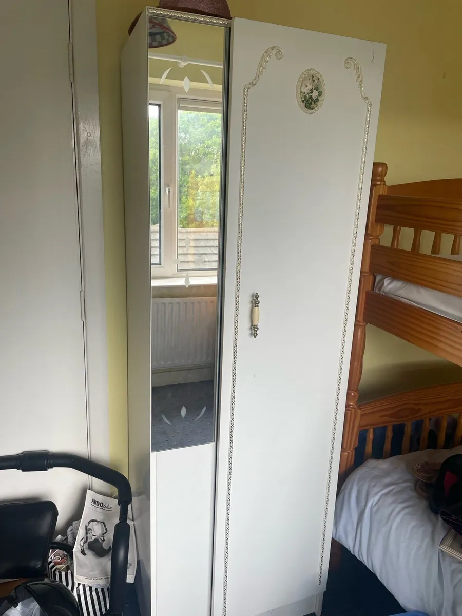 Single white wardrobe mirror attached - Image 1