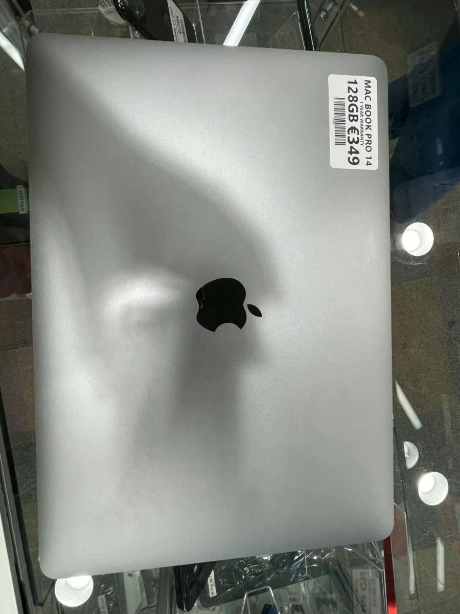 MAC BOOK PRO 14 128GB 1 YEAR WARRANTY UNLOCKED - Image 1