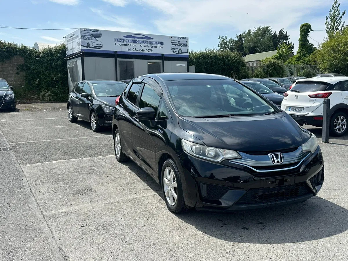 2014 HONDA FIT 1.5L HYBRID LOW MILEAGE - Image 1