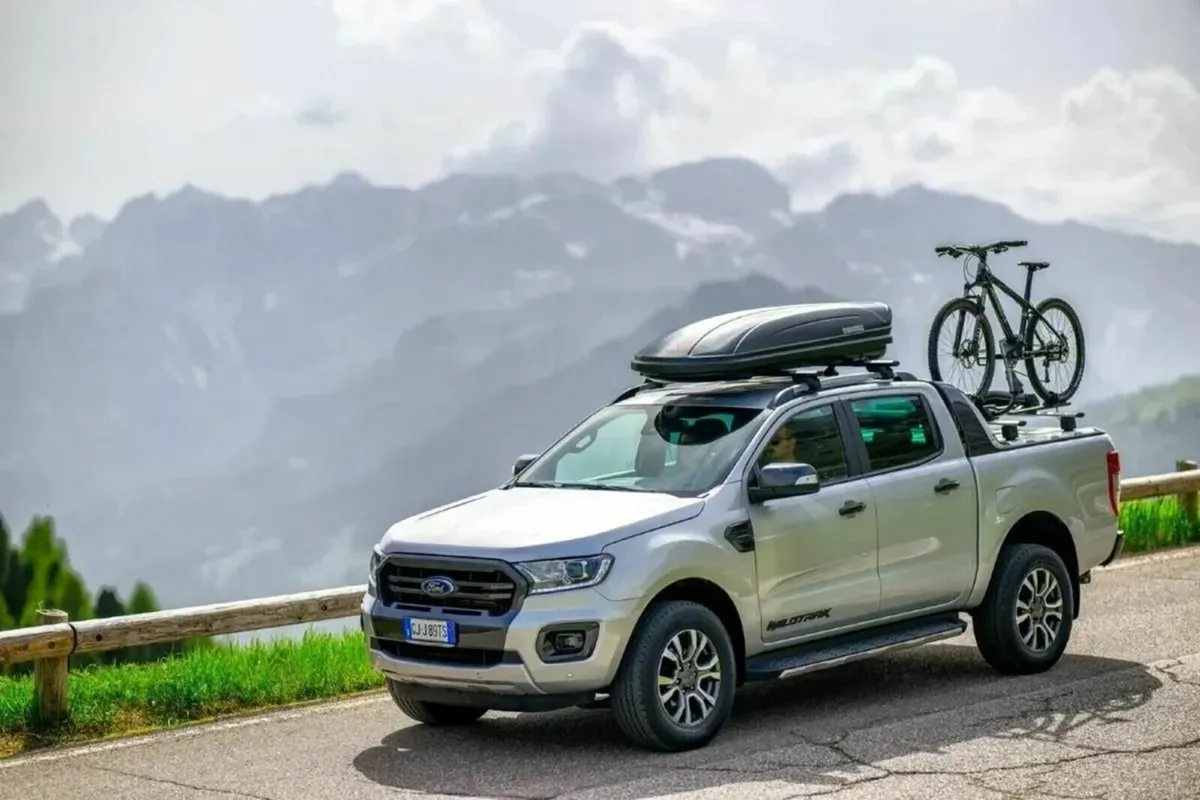Menabo Bicycle Carrier and Roof Boxes - Image 1