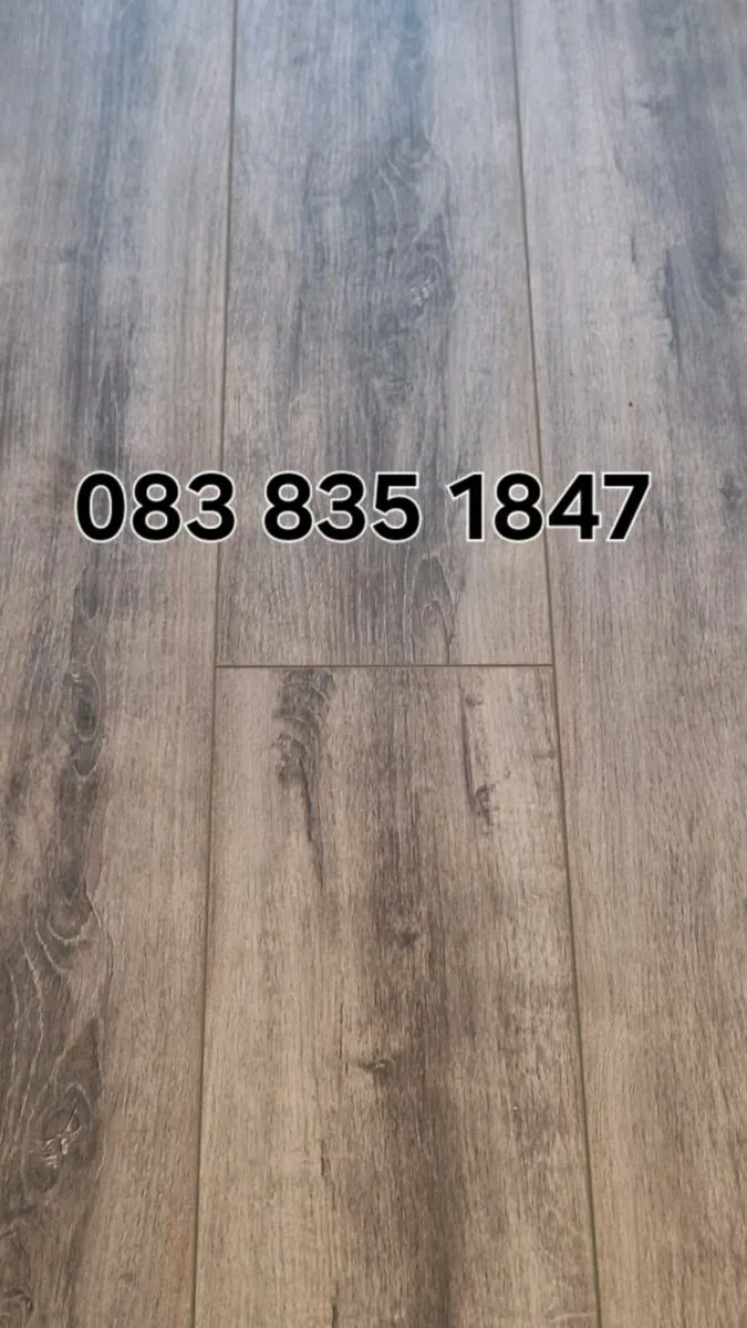 7mm New dark grey Malaga laminated flooring - Image 1